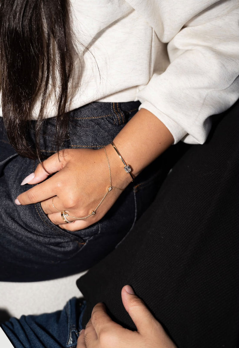 Emerald Diamond Bangle with the Avra Hand Chain